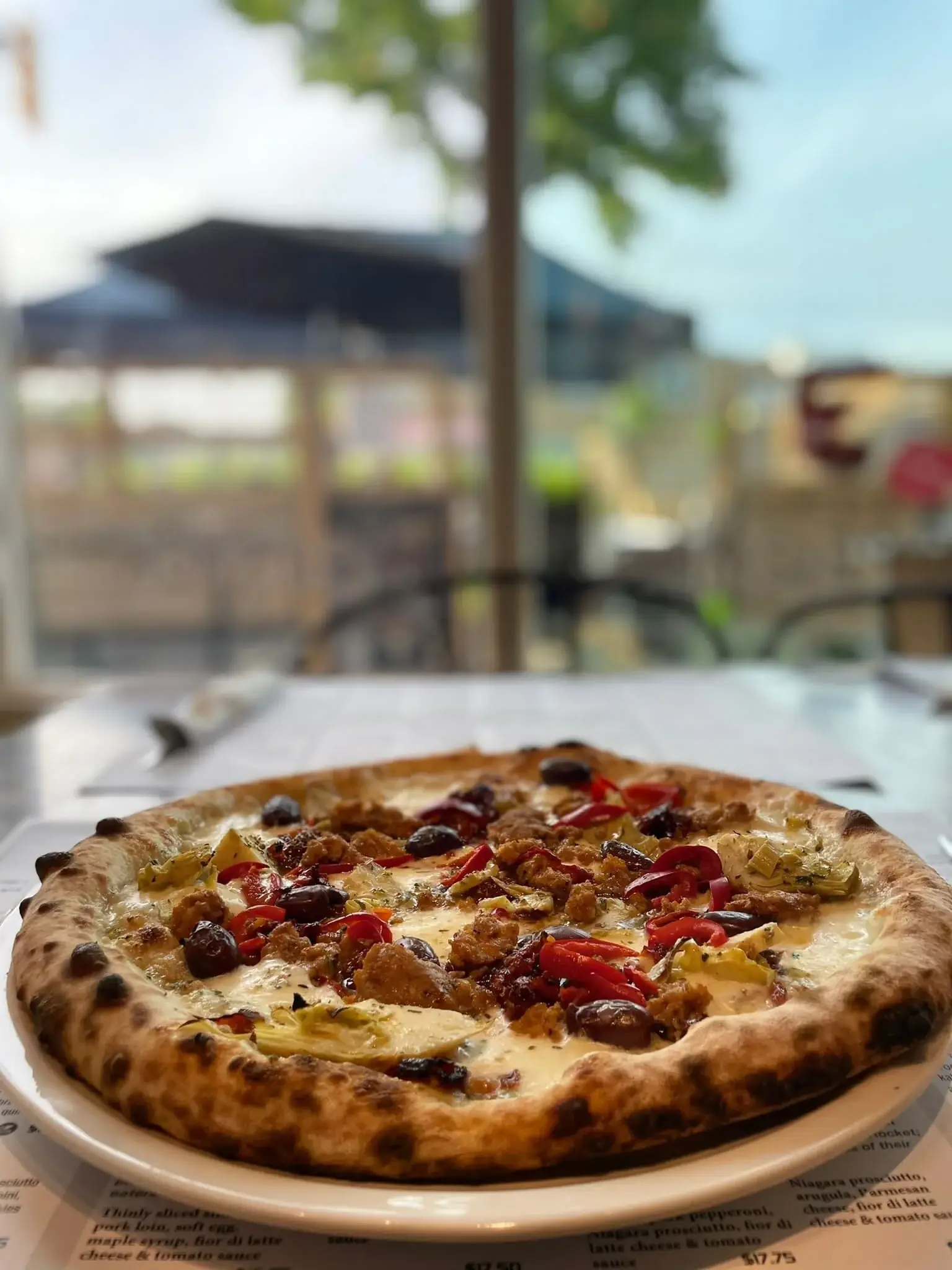 Artichoke, Buffalo Mozzarella, Kalamata Olives, Smoked Chilli Peppers and Wild Boar Sausage. Vegan Option is also available.